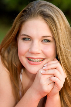Smiling Girl with Orthodontic Braces